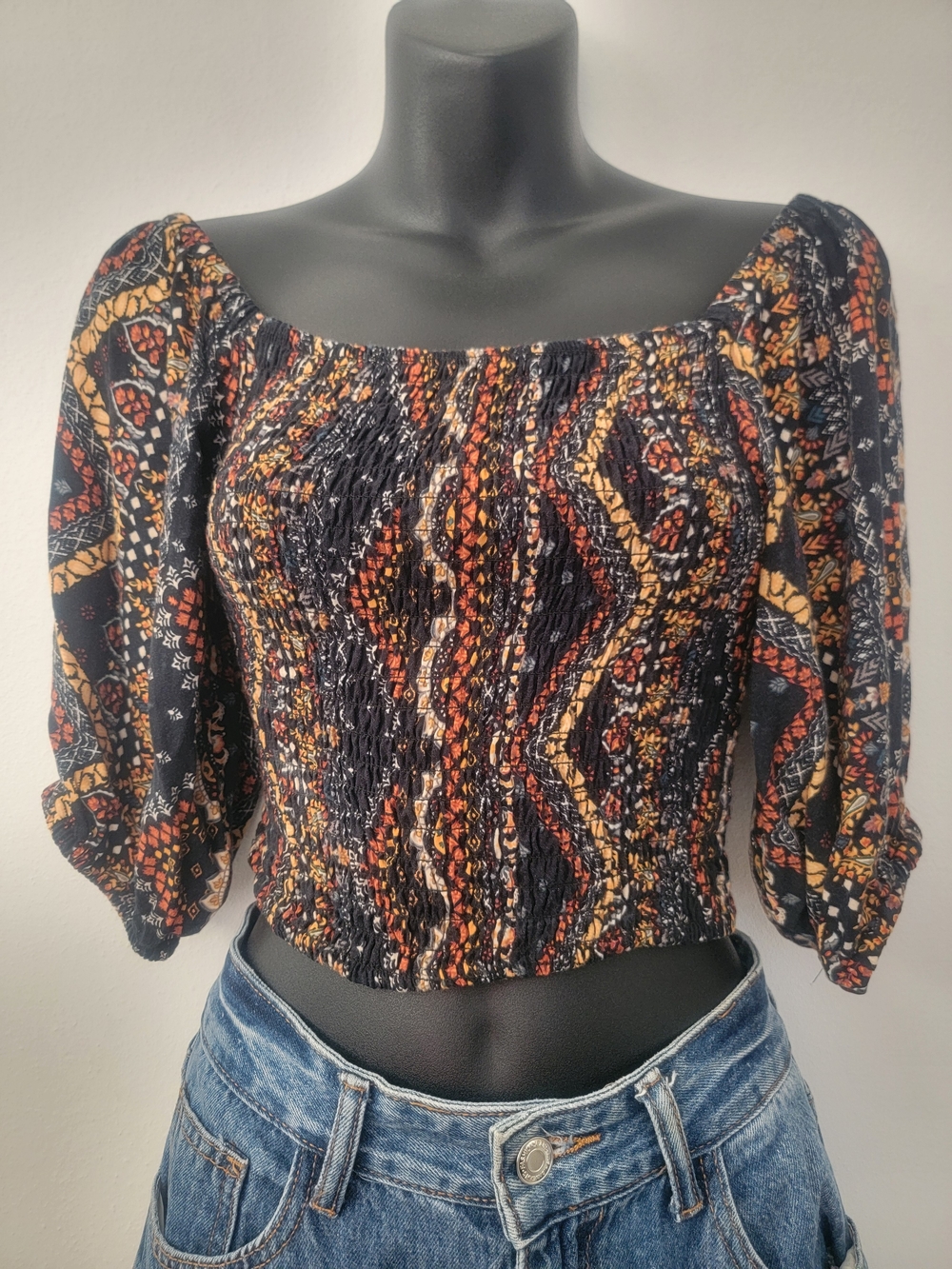 Smocked Off-Shoulder Crop Top in Black and Rust
